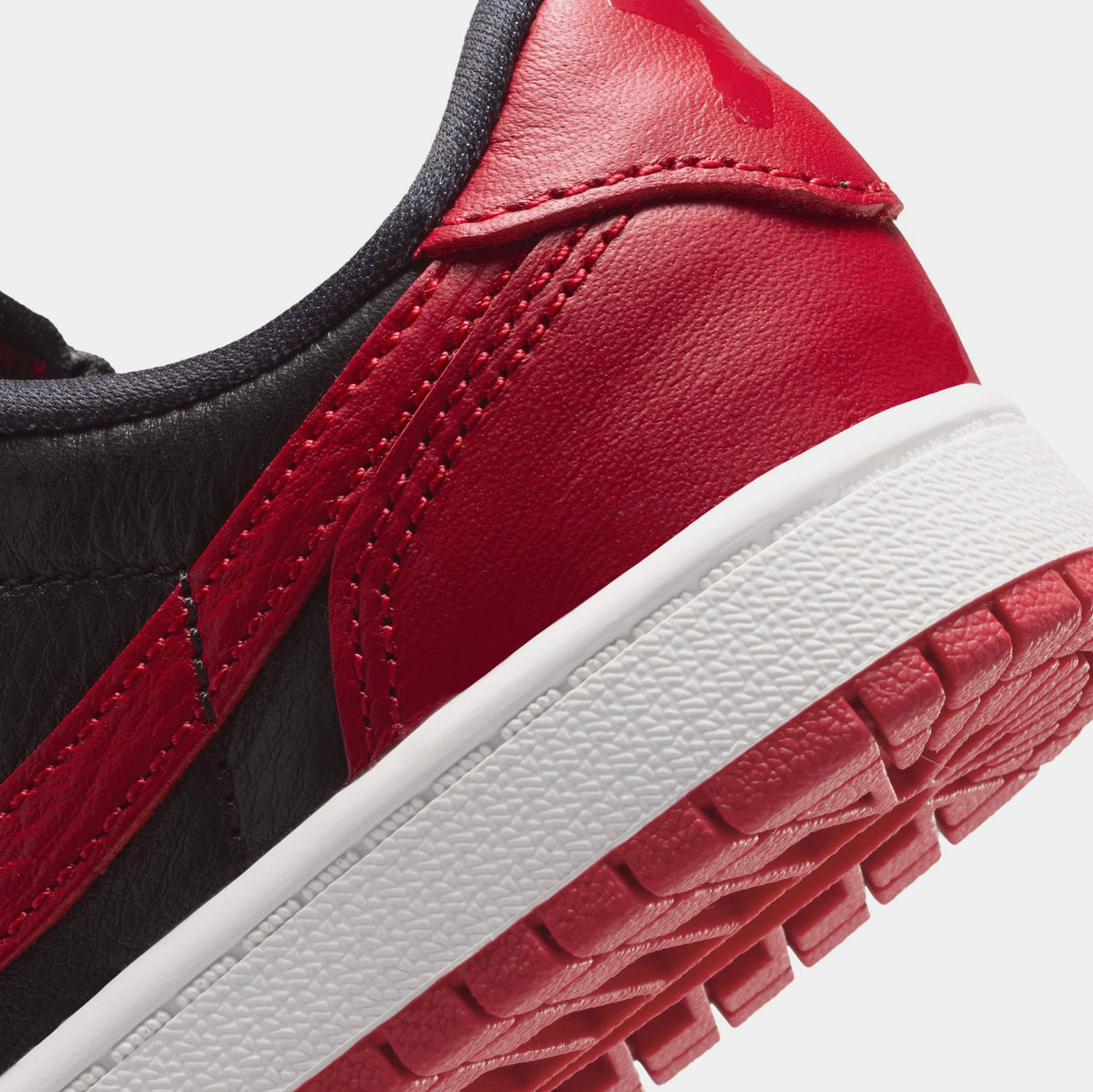 Air Jordan 1 Retro Low OG Banned Preschool Lifestyle Shoes (Black/Black/Varsity Red/Summit White)